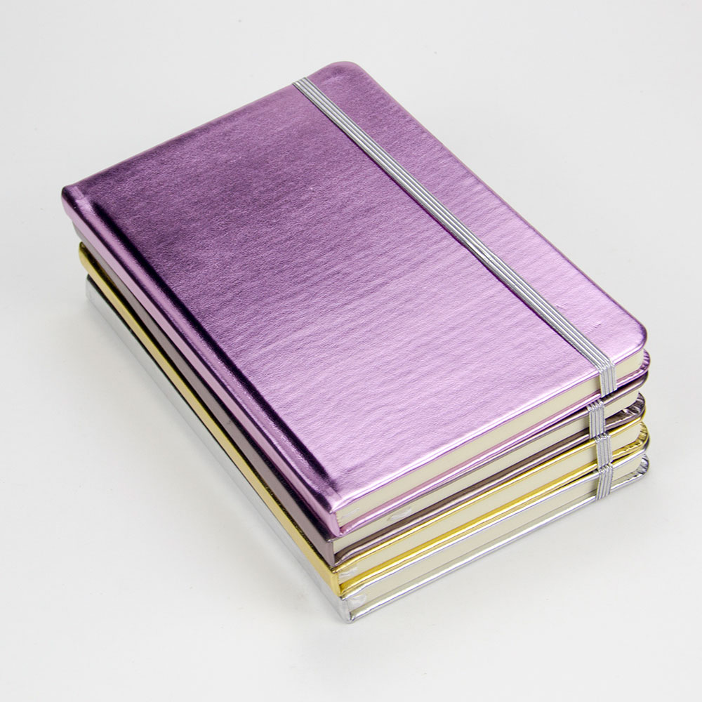 Carnets en cuir gravés